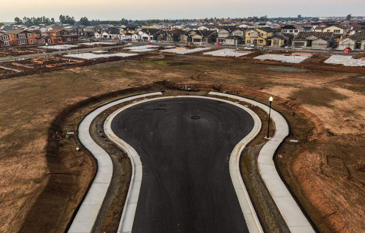 Homes rise as part of the Madeira Meadows development in Elk Grove in November. Home construction in the region has not kept up with demand.