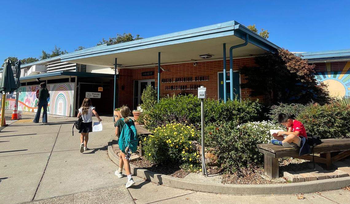 Students walk into Phoebe A. Hearst Elementary School last year. The school uses an entrance exam, a practice that the state attorney general’s office has questioned.