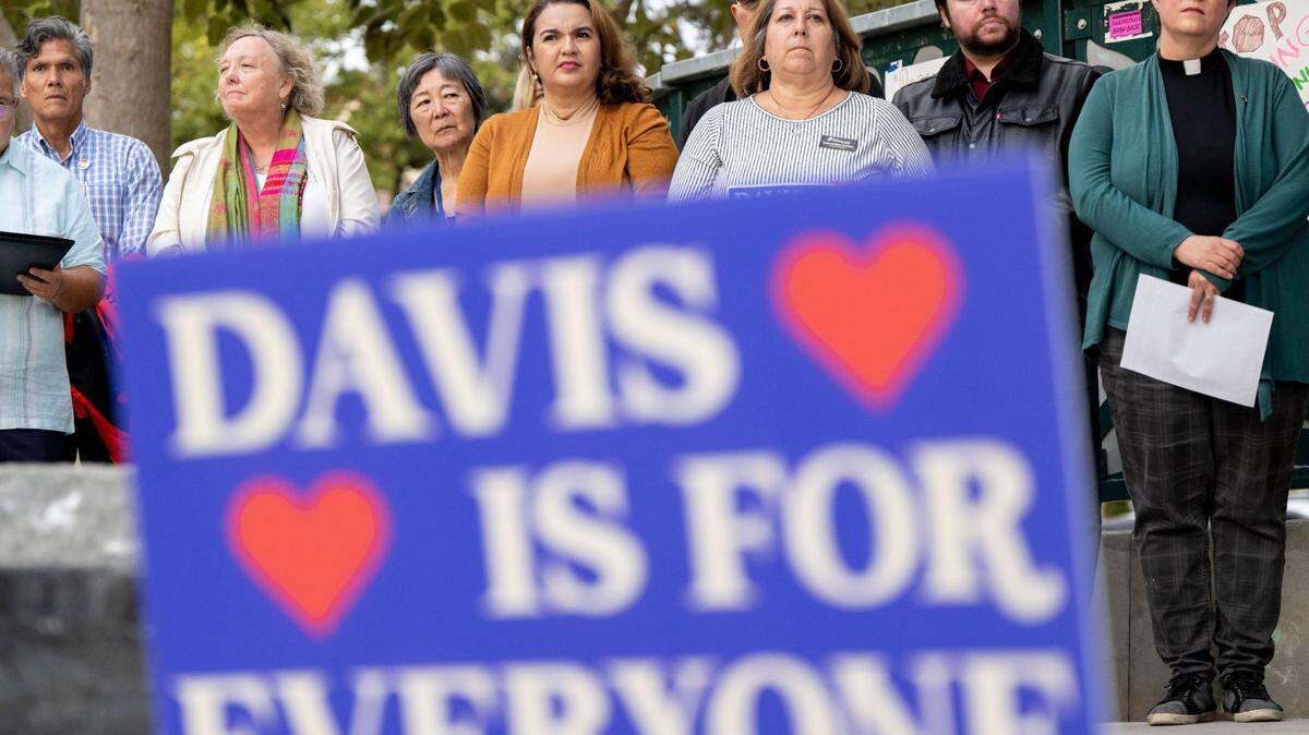 Speakers line up on stage during the Yolo is for Everyone event at Davis’ Central Park on Tuesday, Oct. 10, 2023, as members of the community ralled in support of the LGBTQ community after recent bomb threats against the city’s schools and library.