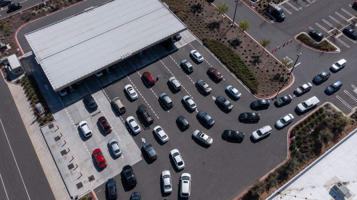 Customers line up for gas on Monday, March 14, 2022, at the Costco in Elk Grove, where regular gasoline was $5.19. The average price in Sacramento County on Monday was $5.65, according to AAA.