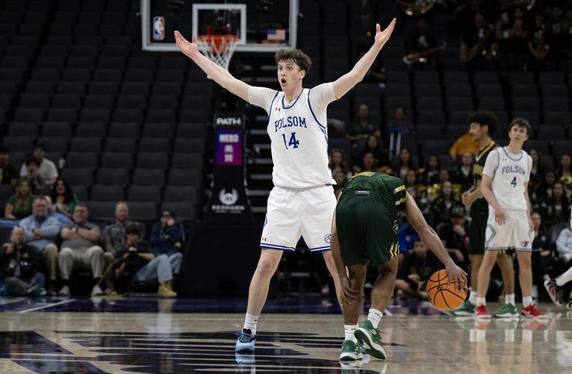 The Folsom Bulldogs' Alec Day (14) reacts after being called for a foul in the second half against the Damien Spartans in the CIF State Division I boys basketball championship Friday at Golden 1 Center.