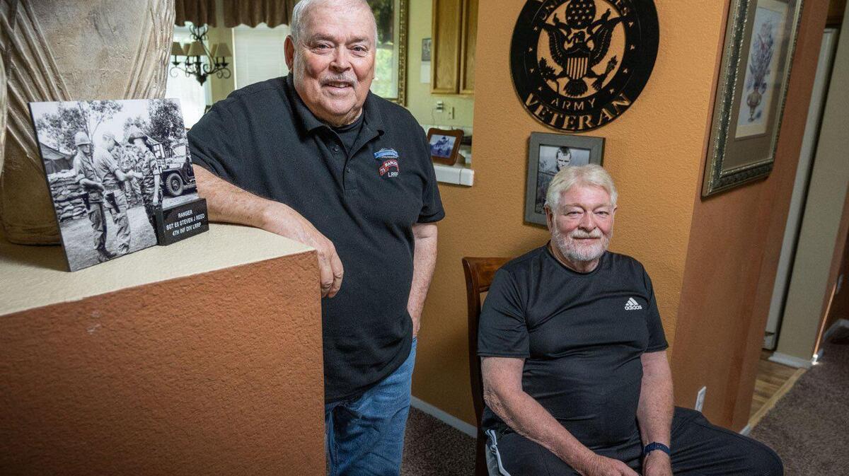 Elk Grove resident Steve Reed, a Vietnam War recon patrol veteran and former Sacramento police detective, and veteran Gene Burchett, of El Dorado Hills, discuss in May the process of collecting VA benefits. Reed has been helping veterans like Burchett get services from the VA by guiding them through the process of receiving benefits for their service.