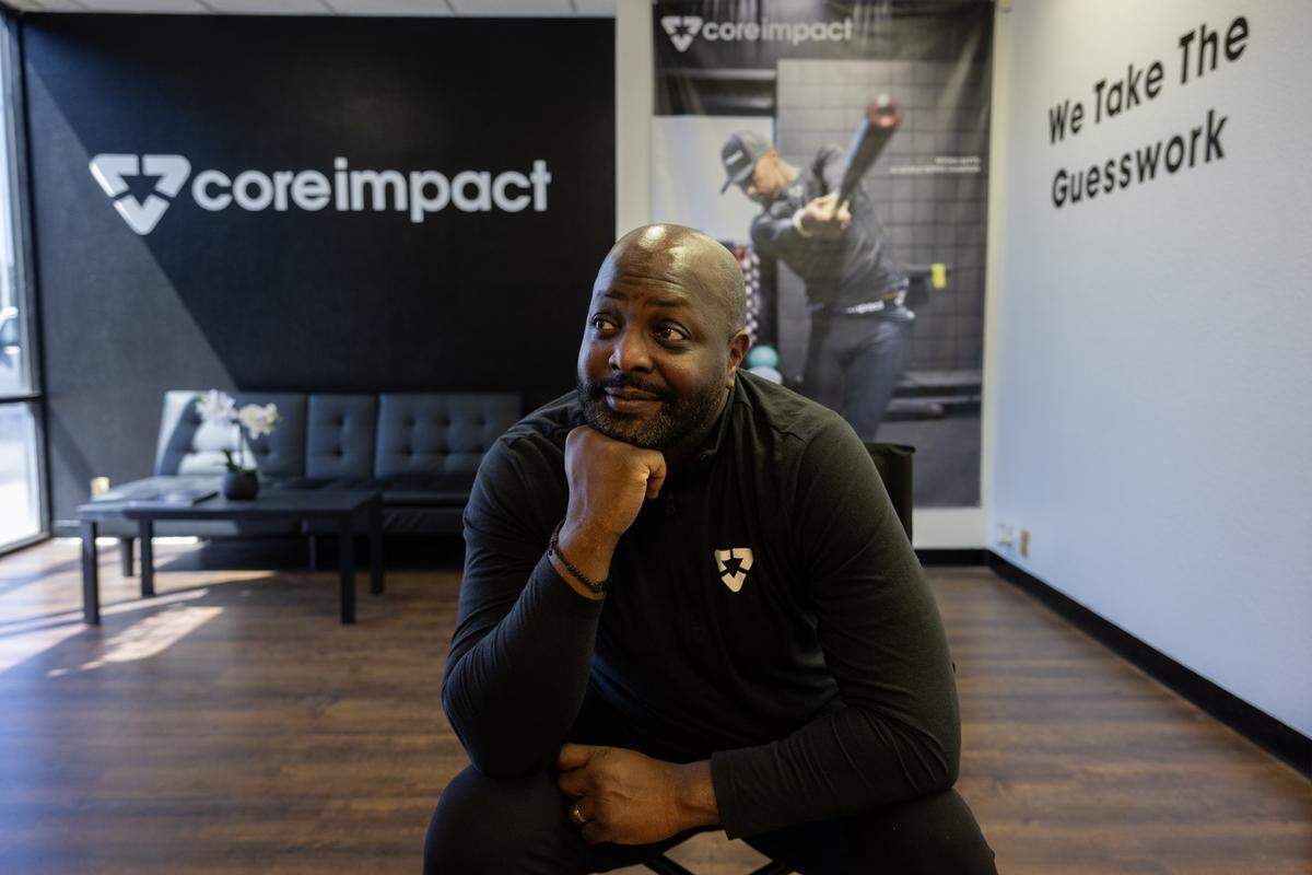Sam Taylor, who created a product for athletes that tracks muscle use, poses for a portrait at his Elk Grove-based sports technology company Core Impact last month.