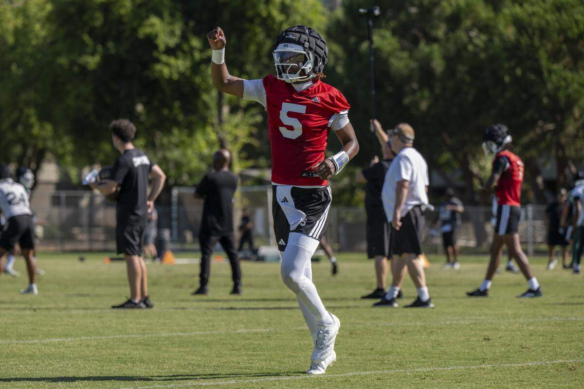 Quarterback Jaden Rashada (5) jogs off the field during the first practice of the season for the 2025 Sacramento State football team on Friday, August 1, 2025 in Sacramento.