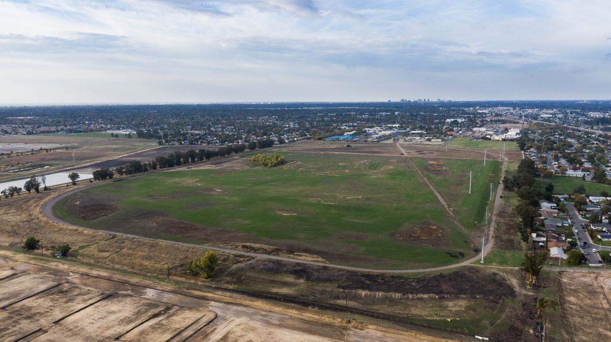 The 102-acre site the city Sacramento purchased a few years ago awaits future planning as the outlines of new roads from the Delta Shores development encroach on its location earlier this week. The property, once used as a California Highway Patrol testing track but vacant for many years, is being considered for various uses –including mixed income housing, interim homeless support and sports/recreation facilities.