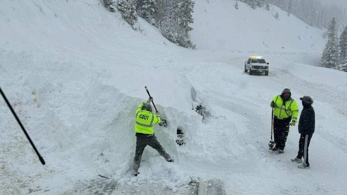An avalanche buried 10 cars on Berthoud Pass, officials said.
