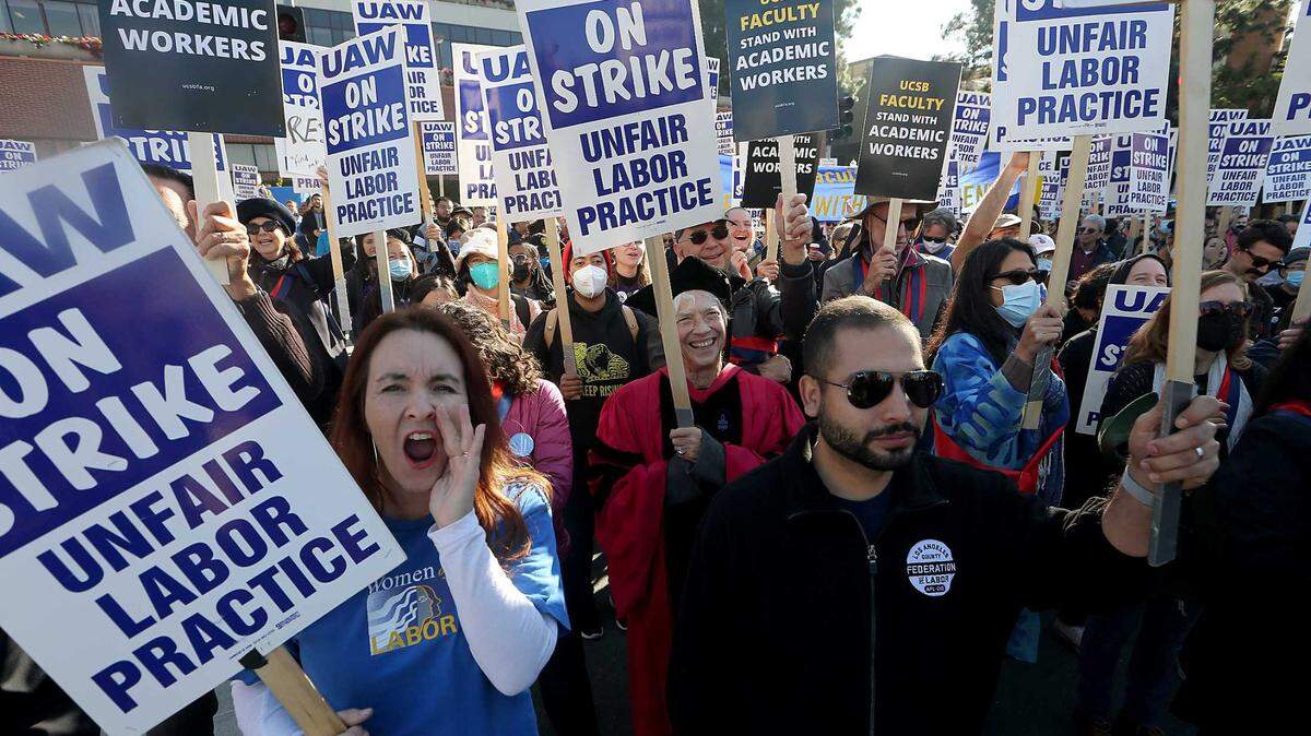 Striking University of California academic workers and faculty gather at UCLA, where the UC Board of Regents met on Dec. 14, 2022. The union members are demanding better pay and benefits.