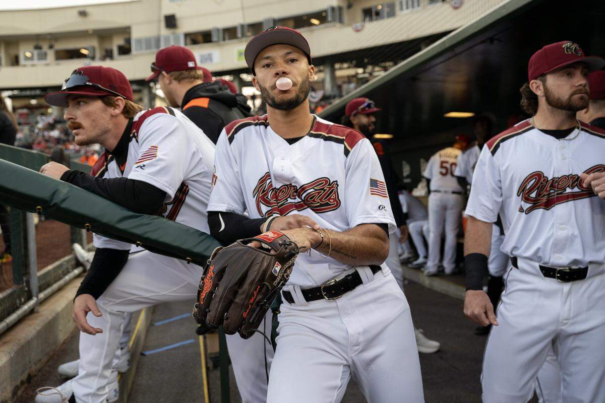 Sacramento River Cats outfielder Grant McCray and his teammates wait to be introduced on Opening Day of the River Cats’ 2025 season on March 28 at Sutter Health Park in West Sacramento.