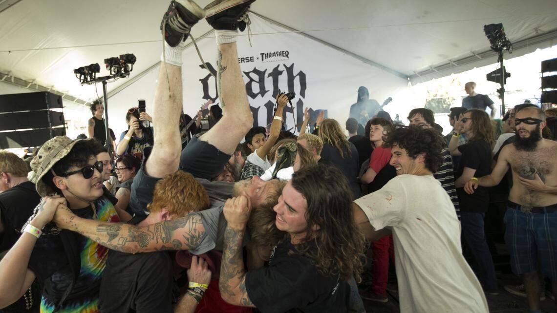 Anthony Sardella, of Philadelphia, crowd surfs during a set by The Spits at the Converse Thrasher Death Match at Gypsy Lounge at SXSW on Thursday, March 19, 2015. Could mosh pits cure America’s male loneliness epidemic?