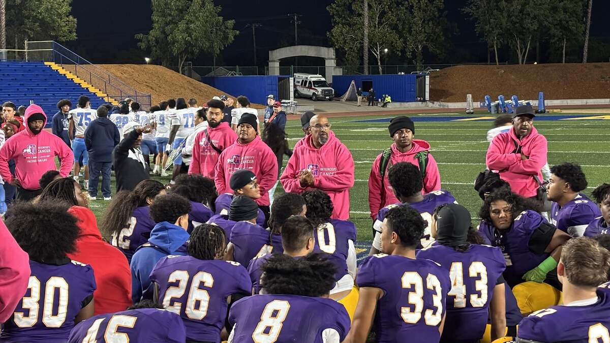 Grant Union High School coach Carl Reed addresses the Pacers after a 42-6 win over Destiny Christian Academy on homecoming night Friday at Grant in Del Paso Heights.