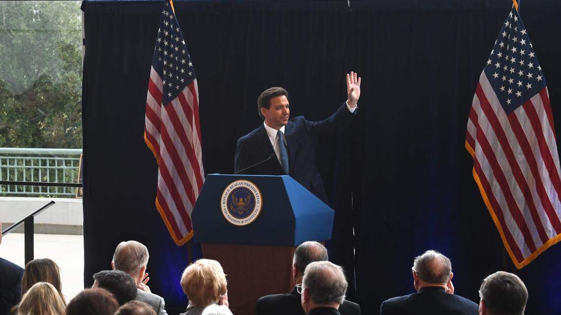 Florida Gov. Ron DeSantis waves to the hundreds in attendance in the Air Force One Pavilion of the Ronald Reagan Presidential Library & Museum in Simi Valley on Sunday.