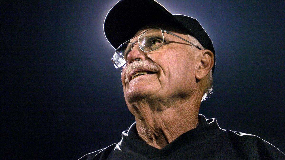Frank Negri watches as 300 of his former players take the field at halftime during the school’s first varsity home game at the new facility on Oct. 15, 2004. Now helping the Rio Linda Knights, Negri started coaching football at Highlands High when the school launched in 1957. He then opened Rio Linda High in 1962 as its first football coach before moving to Foothill High in 1965 as that school’s first coach.