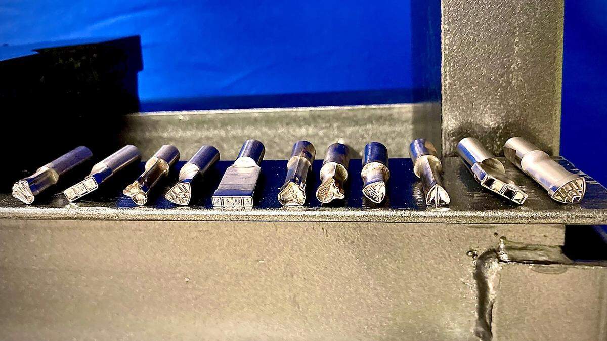 Templates used to press fake brand logos on counterfeit pills, seized by the police in 2022.