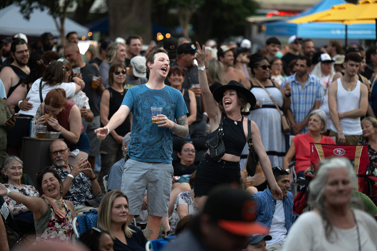 Jonny Lowe and Britney Ruiz of Sacramento dance during the intermission at the Concert in the Park on Friday, June 27, 2025 at Cesar Chavez Plaza in Sacramento.