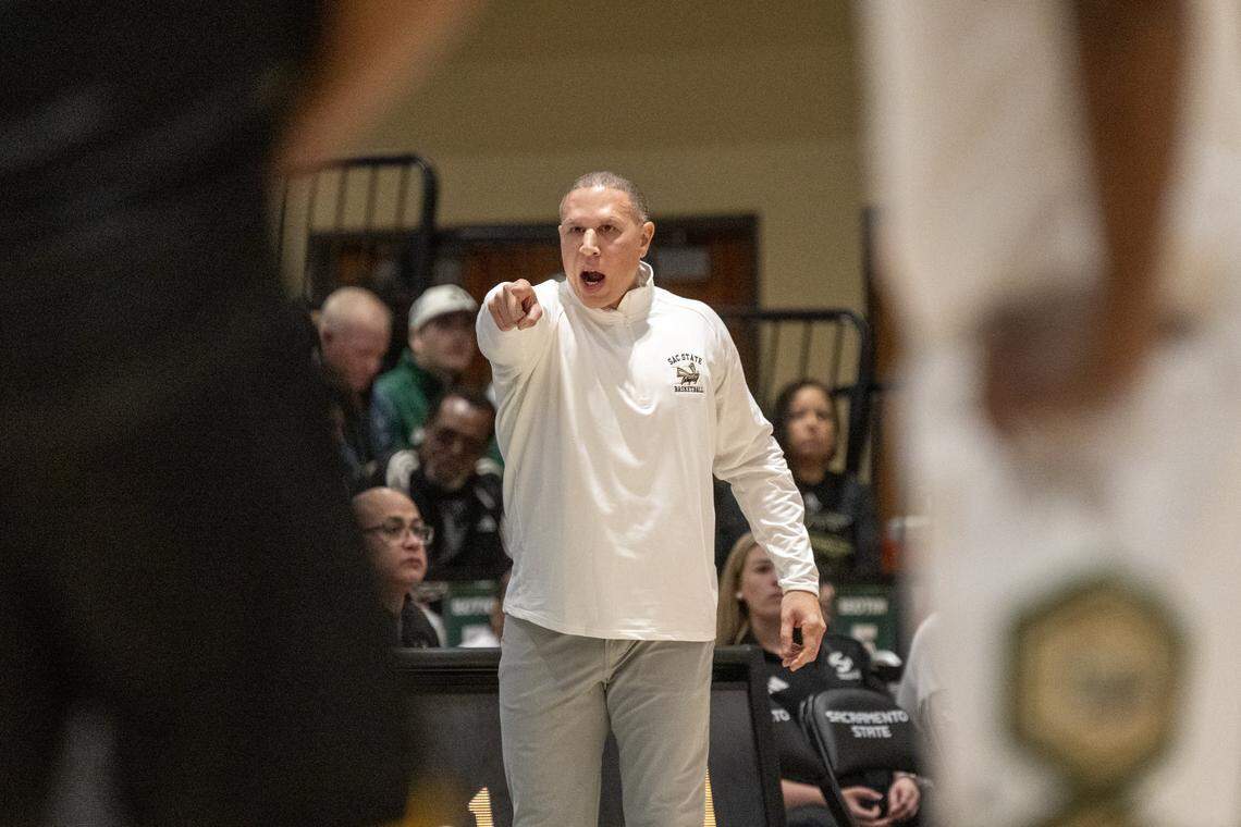 Sacramento State Head Coach Mike Bibby talks to players during the season-opening game at Hornet Pavilion on Nov. 4.