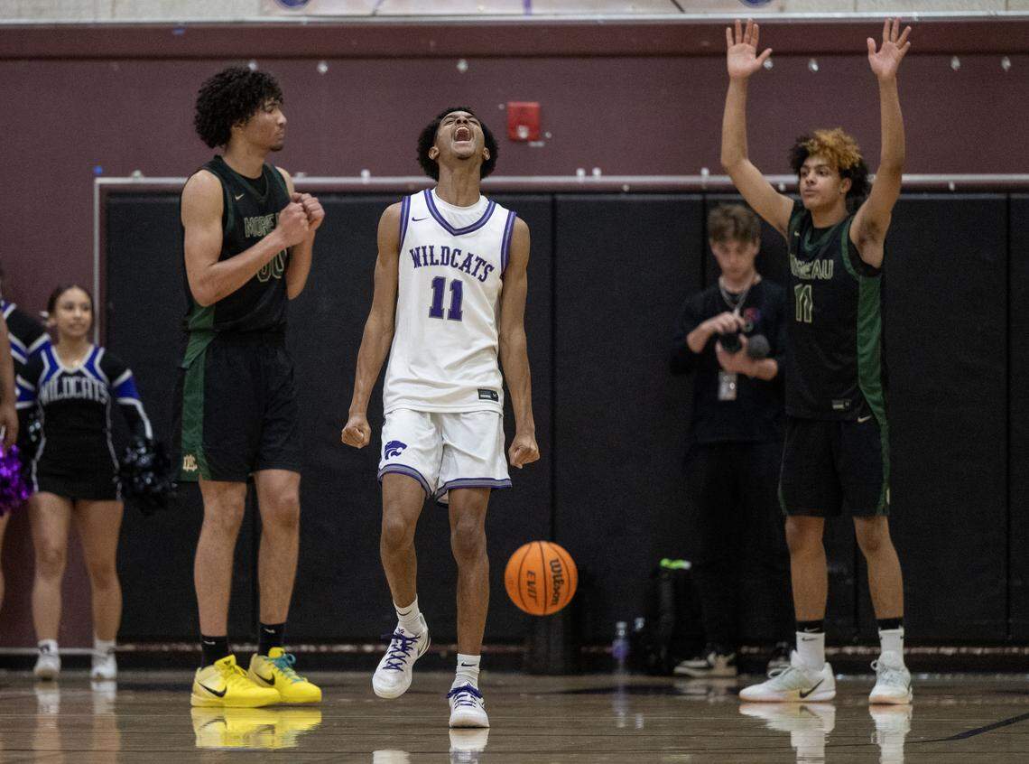 The Franklin Wildcats' Kwali Simmons celebrates after he was fouled while scoring a basket in the second half on Tuesday in the CIF Northern California Division I Regional boys basketball opener in Elk Grove.