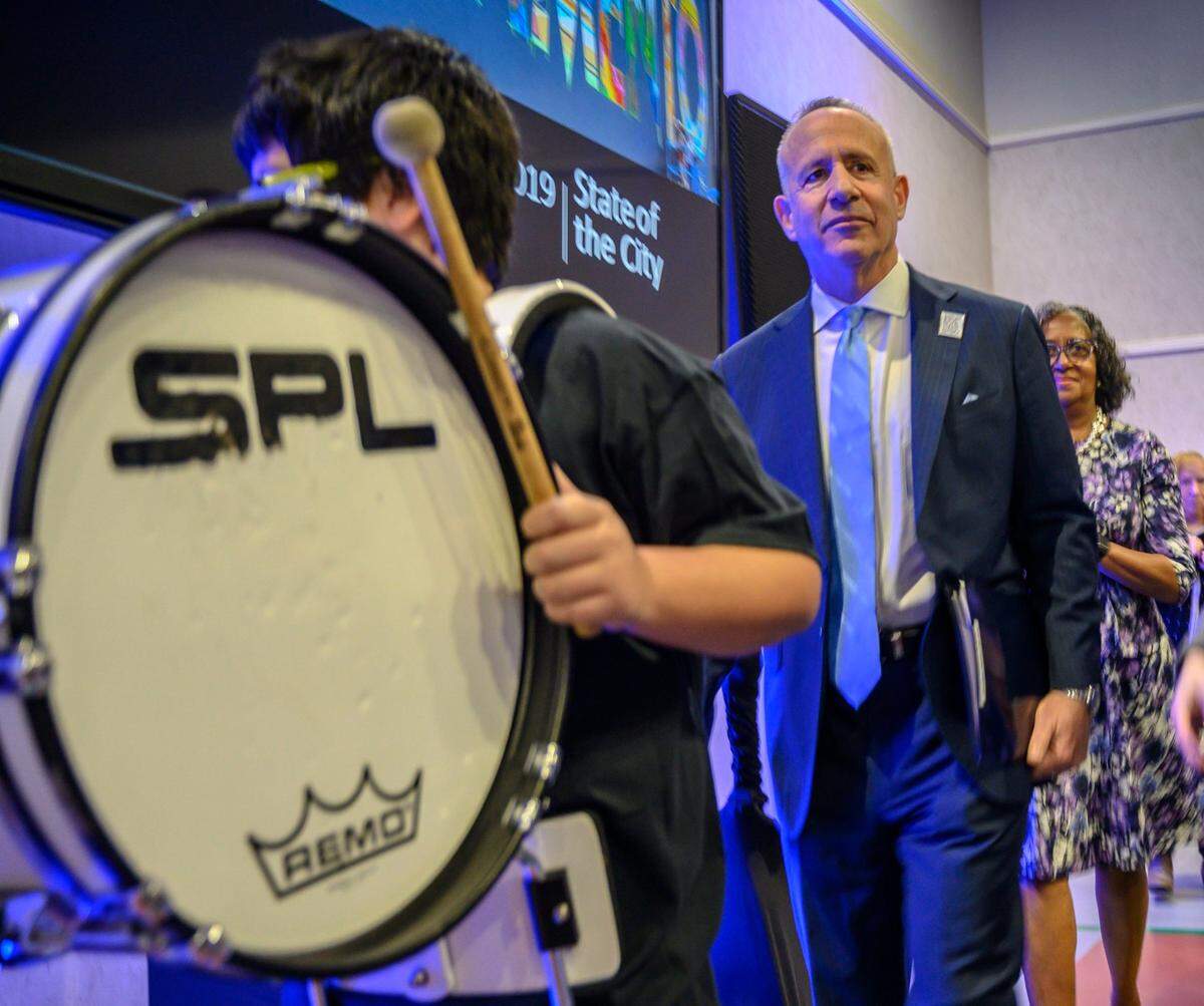 Sacramento Mayor Darrell Steinberg follows students from John Still Middle School as he prepares to give his State of the City address on Feb. 19, 2019 at the Sam & Bonnie Pannell Community Center in Sacramento.