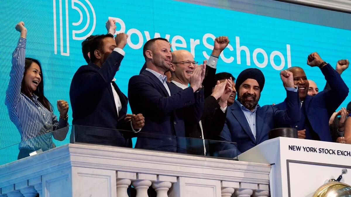 PowerSchool CEO Hardeep Gulati, second from right, rings the New York Stock Exchange opening bell, celebrating his company’s IPO, Wednesday, July 28, 2021. (AP Photo/Richard Drew)