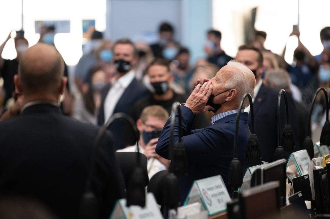 President Joe Biden leads a chorus of “Happy Birthday” for California Office of Emergency Services employee Joanna Bautista, 27, during a briefing on the impacts of the state’s wildfires at the OES command center at Mather Airport on Monday.