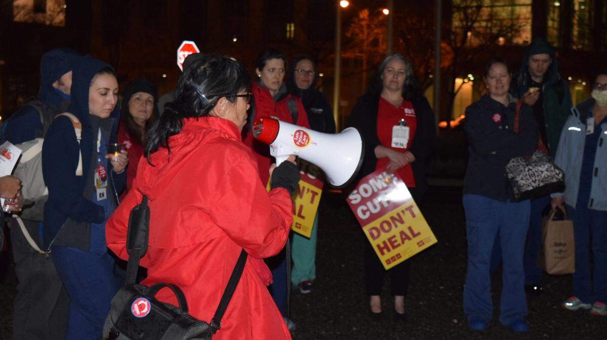 Union representative Shirley Toy got nurses ready to rally at an informational picket at UC Davis Medical Center in January. The 14,000 registered nurses in the union, the California Nurses Association, approved a new contract late Friday.