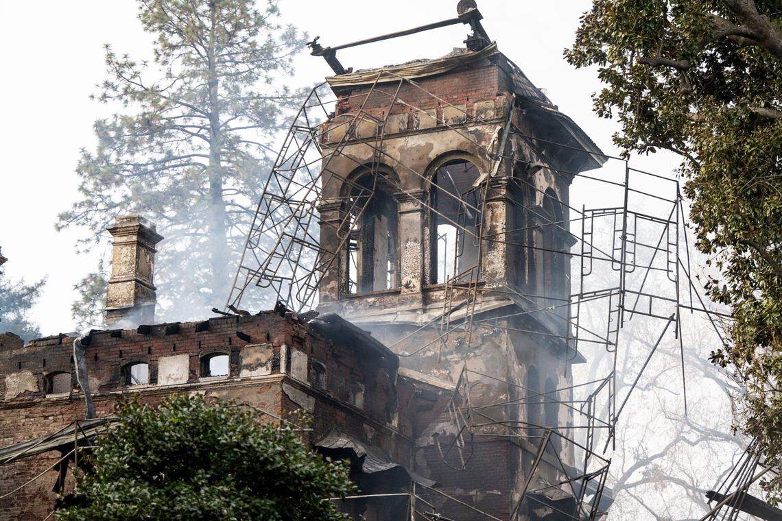 Jumbled scaffolding surrounds the central tower of Chico’s historic Bidwell Mansion after it was destroyed by fire on Wednesday.