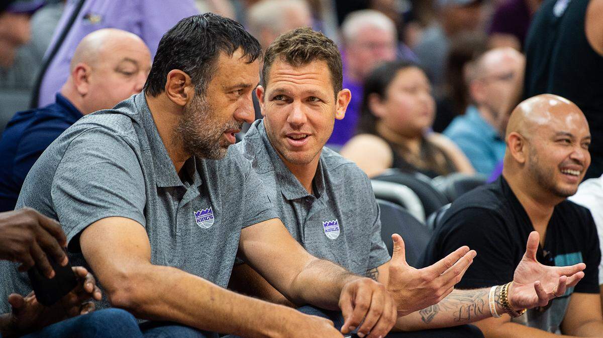 Sacramento Kings general manager Vlade Divac talks with coach Luke Walton during the California Summer classic at Golden One Center on Monday, July 1, 2019 in Sacramento.