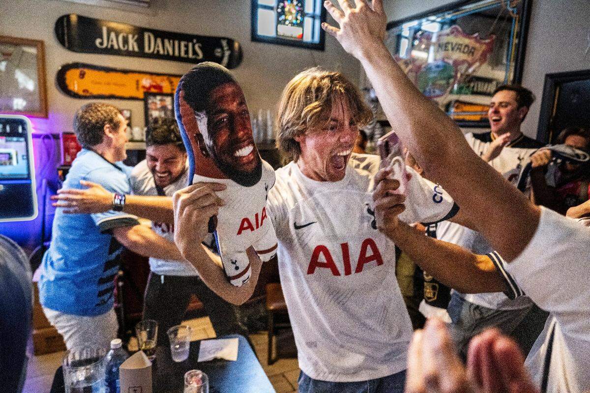 Ethan Durns, of Sacramento, celebrates the winning goal by his team Tottenham against Manchester United during the broadcast of the Europa League championship on Wednesday at the Zebra Club in Sacramento.