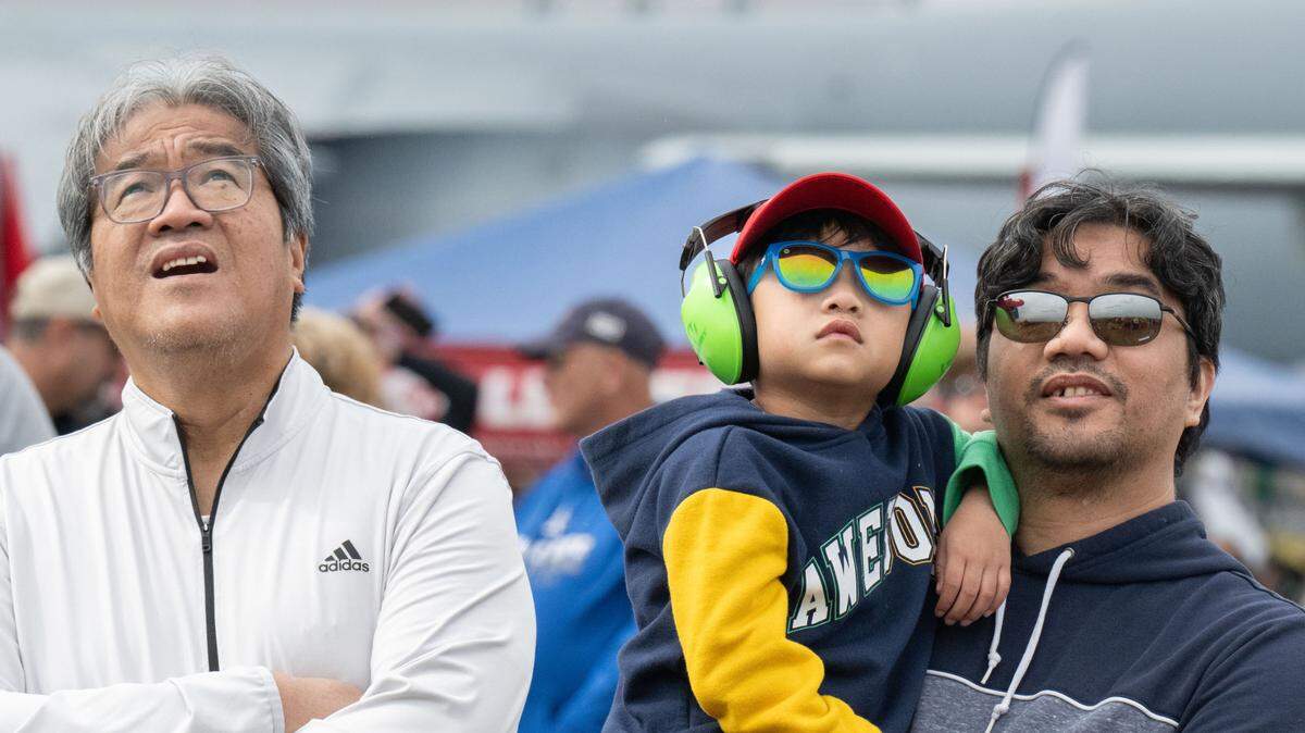Emmanuel Santos, left, his grandson Ian and son Evan watch the U.S. Marine Corps F-35B demonstration at the California Capital Airshow at Mather Airport on Saturday, March 22, 2025. Mather will receive a $5.8 million grant for runway rehabilitation.
