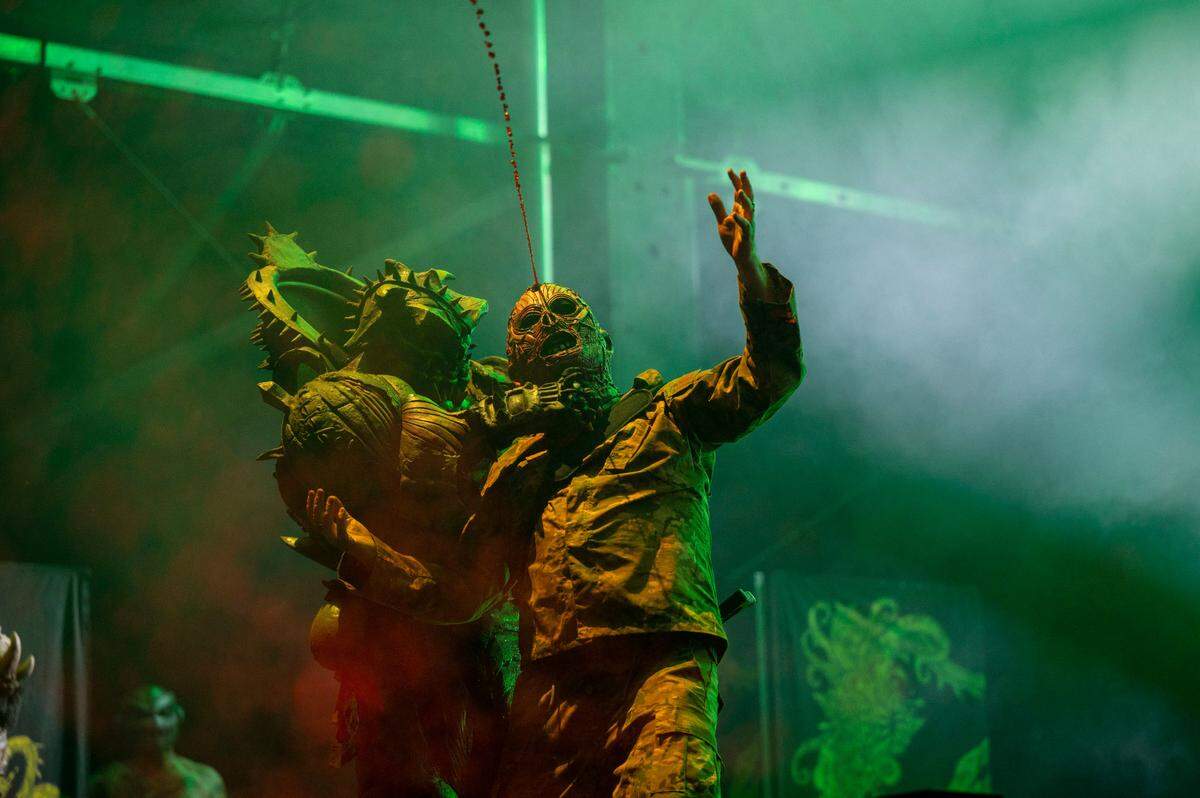 Members of the band Gwar squirt fake blood at the audience at the Aftershock Festival on Friday night.