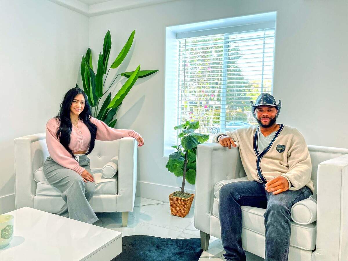 Homeowners Jessica Cabellos and Enoch Duplechan in the Elk Grove house they’re selling for $3.4 million.