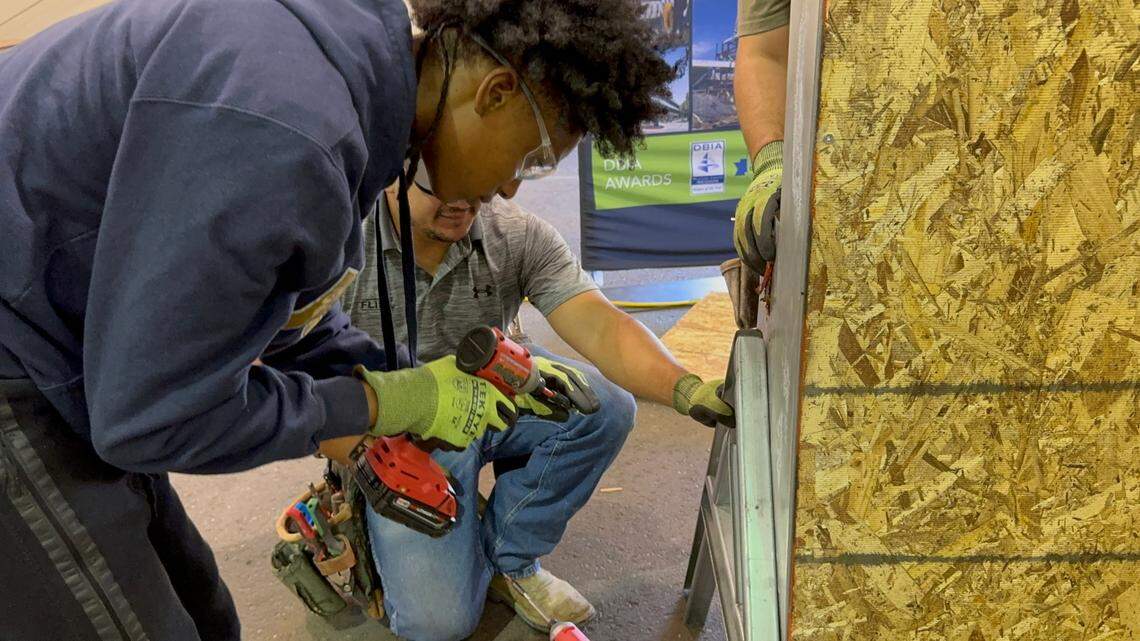 Jaea Chatman, a 17-year-old student at Natomas High School, practices construction skills at a recent High School Trades Day at Sacramento’s Cal Expo.