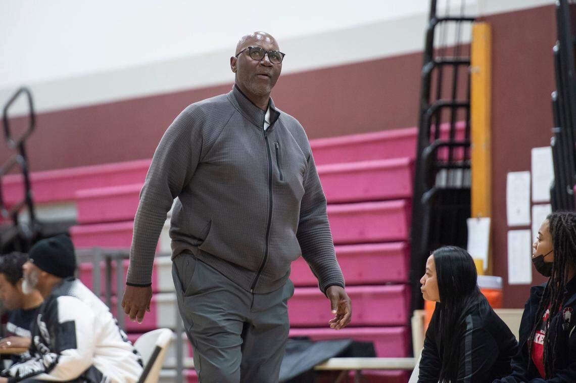 West Campus Warriors coach John Langston looks at the scoreboard as the Warriors hold a three-point lead over Sierra near the end of third quarter in the first-round CIF Sac-Joaquin Section Division III girls basketball playoff game Tuesday, Feb. 14, 2023, at West Campus High School in Sacramento. Langston, still West Campus coach, will see his Warriors face Central Catholic on Friday for the section D-IV title.