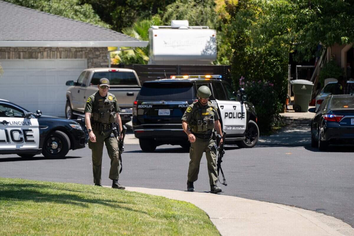 Police officers leave Zion Court in Rocklin after murder suspect Eric James Abril was captured behind the property on Monday, July 10, 2023, a day after he escaped custody from a Roseville hospital.