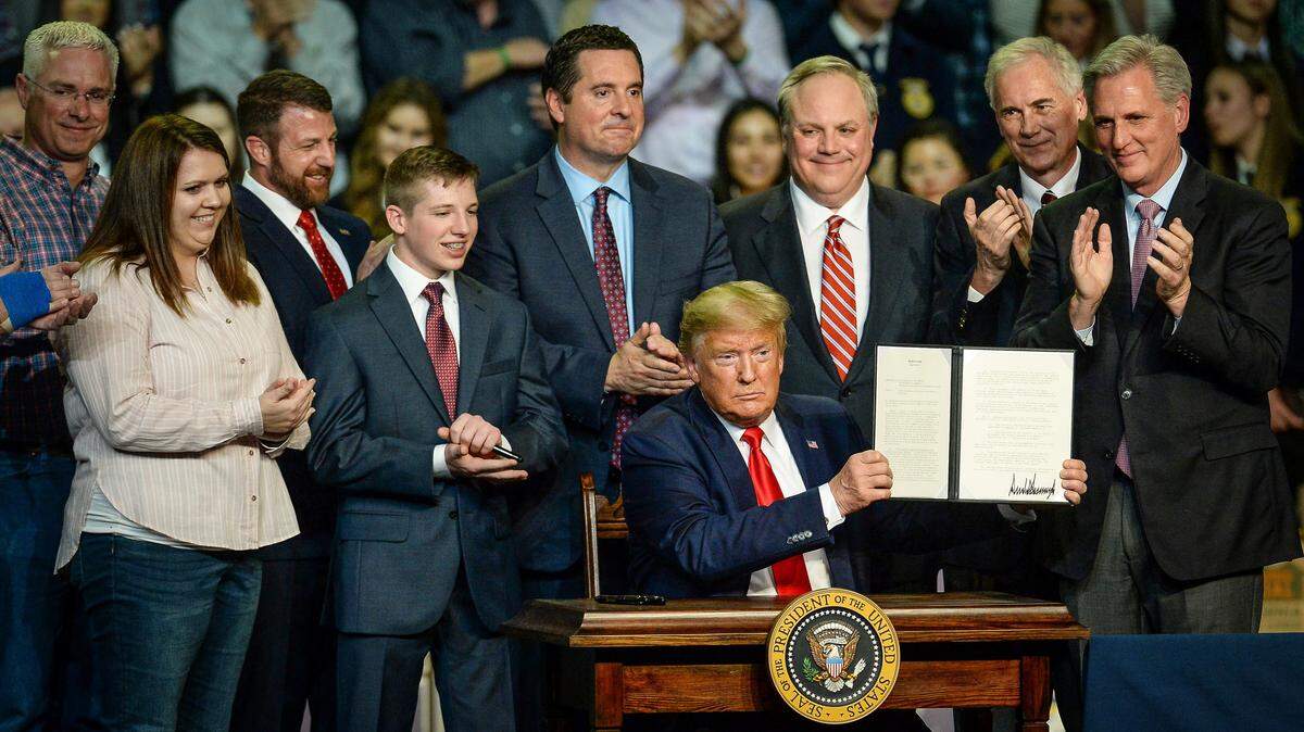 Former President Donald Trump visited Bakersfield on, Feb. 19, 2020. Rep. Devin Nunes, R-Tulare, seen behind Trump, was among his allies in Congress.