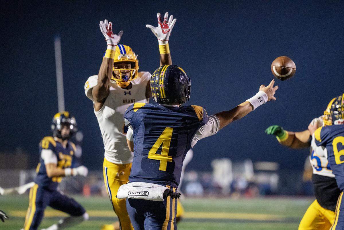 The Grant Pacers' Sosaia Noa (4) applies pressure against the Oak Ridge Trojans' Luke Taber (4) in the CIF Sac-Joaquin Section Division l semifinal in November. Noa signed with Cal. 