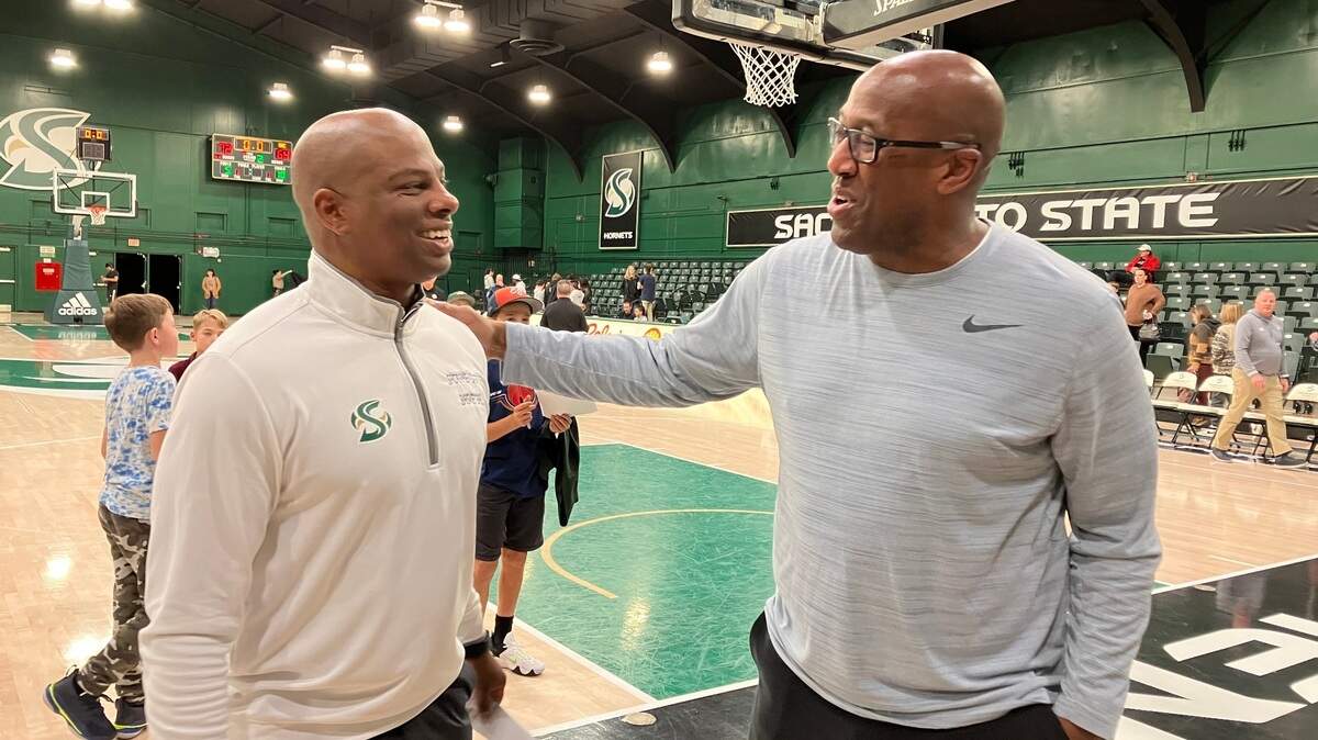 Kings coach Mike Brown, right, with Sacramento State coach David Patrick after the Hornets beat Northern Colorado on Thursday, January 12, 2023. The coaches are longtime friends.