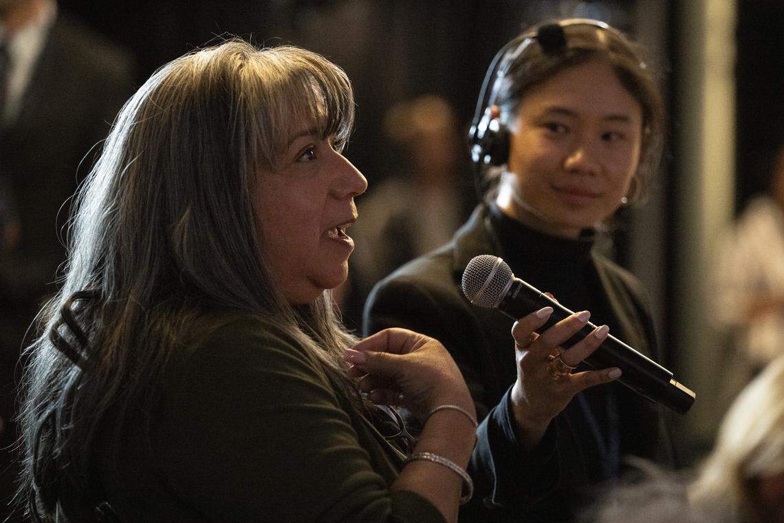 Sacramento native Gina Coates asks a question during a campaign stop for Democratic governor candidate Tom Steyer in Sacramento on Thursday.