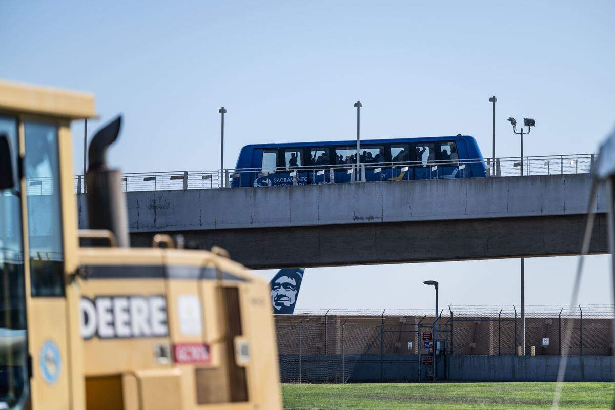The automated tram at the Sacramento International Airport transports passengers from Terminal B to Concourse B during a groundbreaking ceremony for the SMForward program on Monday. The construction project includes a pedestrian skyway along the same route.