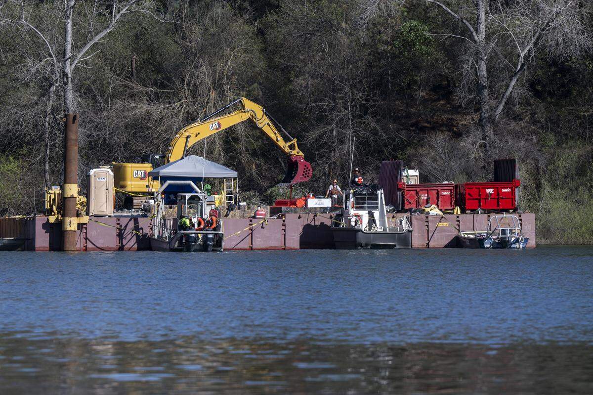 A barge is loaded with equipment used in the cleanup of Englebright Lake on Tuesday, March 3, 2026 following the large pipe rupture at the New Colgate Powerhouse on Feb. 13.