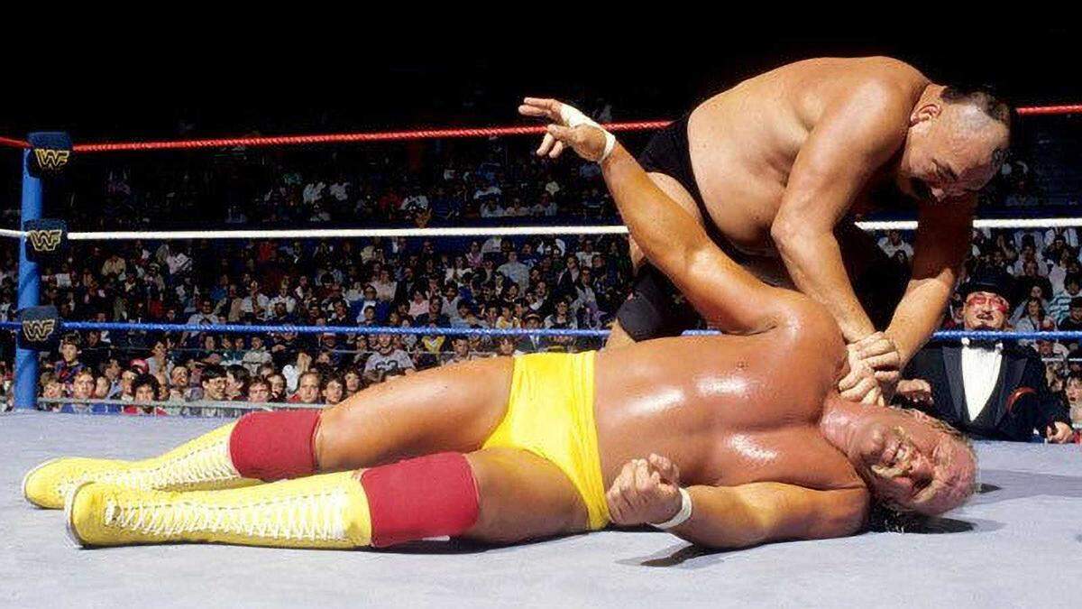 Killer Khan, the stage name of WWE professional wrestler Masashi Ozawa, is seen putting the “Asiatic hold” on Hulk Hogan during a bout on Sept. 12, 1987, in Boston. Ozawa died at the age of 76, New Japan Pro Wrestling announced on Saturday, Dec. 30, 2023.