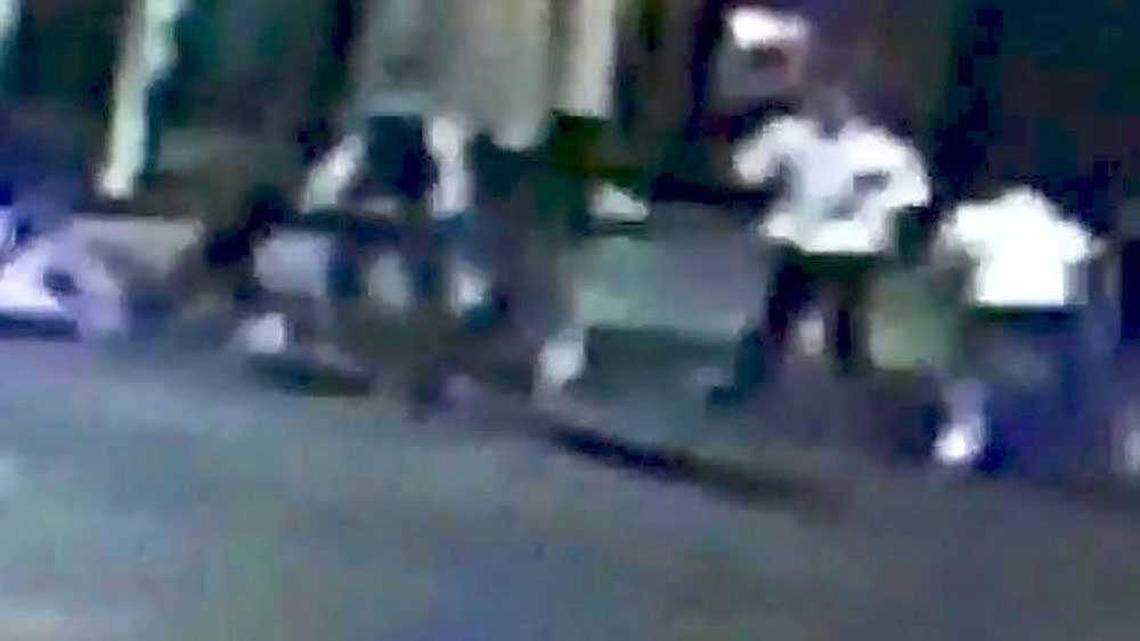 In this cropped screen capture of a surveillance video pointed at 21st and K streets in midtown Sacramento early Thursday, Oct. 8, 2015, Spencer Stone, believed to be the man in a white shirt second from the right in this frame. The video appears to show blood on the man's left chest. A man in a white shirt on the right is believed have stabbed Stone.