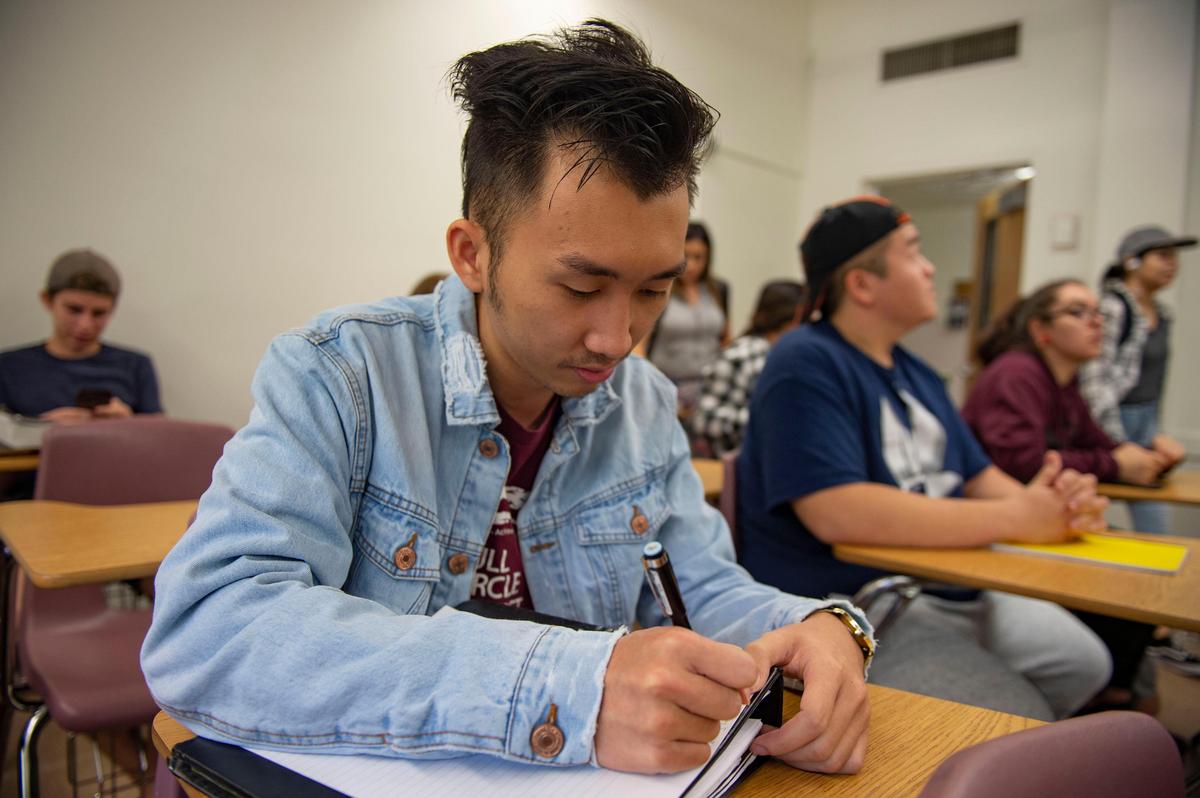 Student Tommy Xiong attends class at Sacramento State on Wednesday, Oct. 23, 2019, where he and his siblings participate in the Full Circle Project, a program designed to help low income first generation college students navigate the complexities of getting a higher education.