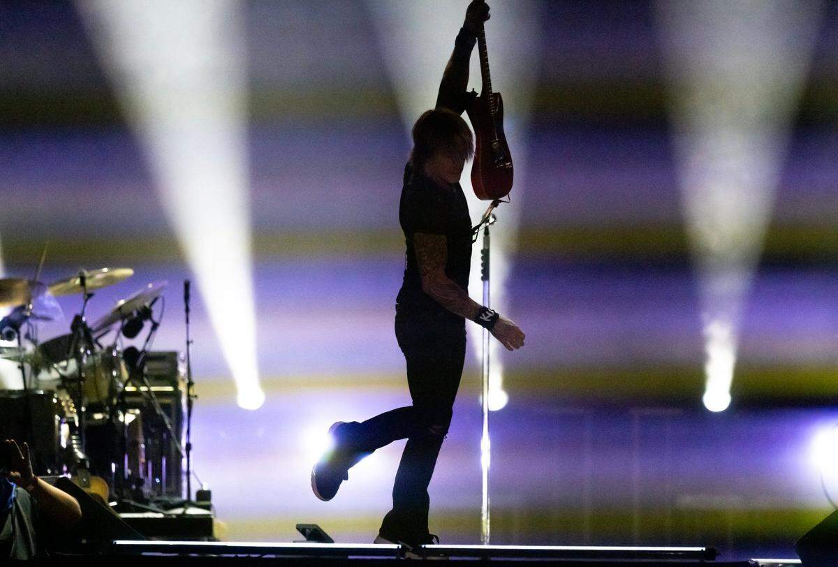 Keith Urban performs during the GoldenSky Country Music Festival at Discovery Park in Sacramento on Friday, Oct. 18, 2024.