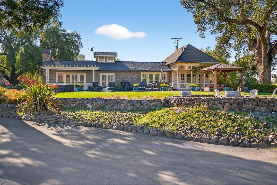 In addition to the main house, shown above, a separate guest house adds 2,300 square feet with three bedrooms and three bathrooms, allowing space for extended family, caretakers, visiting trainers or event-related stays.