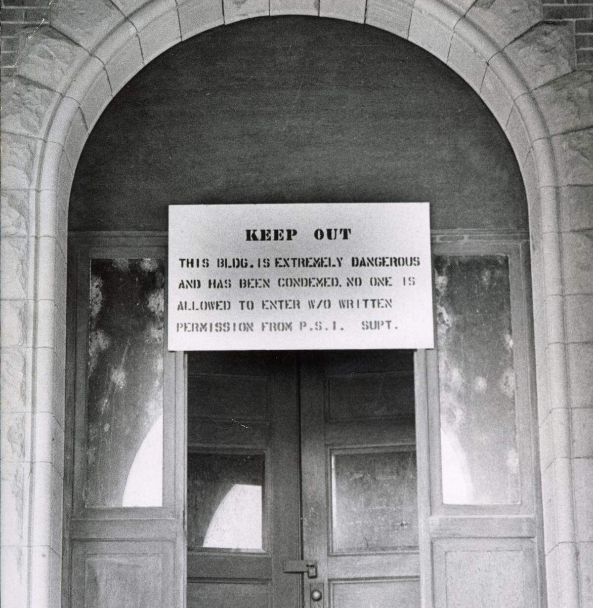 A sign above the front doors of the condemned Preston castle warns visitors to “keep out” at the Preston School of Industry in Ione in 1968.