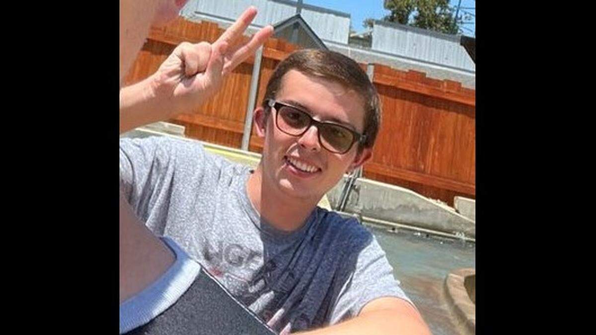 The parents of Christopher Hawley are suing Six Flags over his death. This provided photo shows Hawley, 22, the day he visited Six Flags Magic Mountain in Valencia, California.