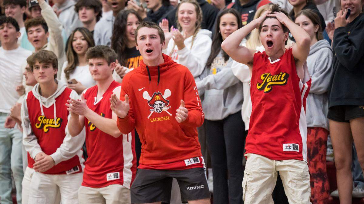 The Jesuit student cheering section cheers as the Marauders overtake Monterey Trail at the high school boys basketball CIF Sac-Joaquin Section playoff game on Feb. 15 at Jesuit High School in Carmichael. Jesuit beat Monterey Trail, 67-65.