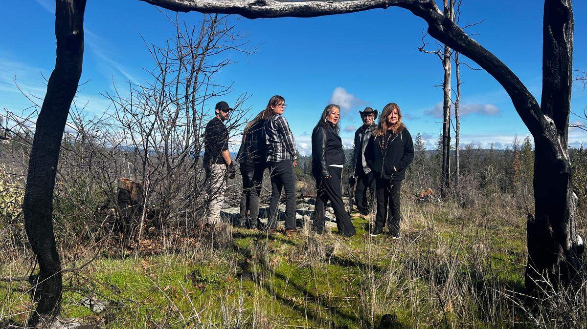 Nevada City Rancheria Nisenan tribal members walk on Yulića land, which once belonged to their tribe, in February. The tribe is seeking to purchase the property from the College Park Friends Educational Association.