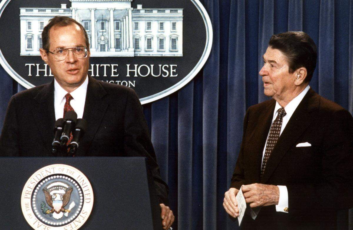 Judge Anthony Kennedy, at the time serving on the 9th Circuit Court of Appeals in California, delivers remarks on Nov. 11, 1987, at the White House after President Ronald Reagan announced he would nominate Kennedy to the U.S. Supreme Court in a third bid to fill a vacancy. The first candidate, Robert Bork, was rejected by the Senate, and the second withdrew after admitting to smoking marijuana.