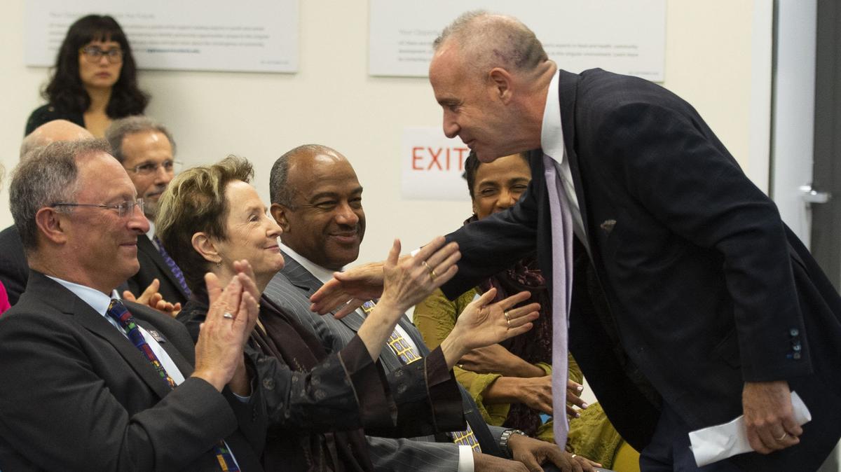 Sacramento Mayor Darrell Steinberg congratulates famed chef Alice Waters at a January 2020 event touting Aggie Square, a development project partnership between UC Davis and the city of Sacramento. Gary May, chancellor of UC Davis, smiles in the background..